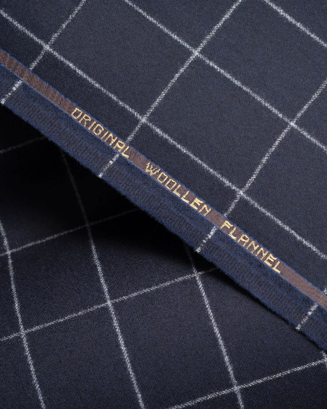 Фланель в клетку, на кромке надпись Original Woollen Flannel